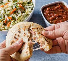 What is the difference between a sope and a pupusa?